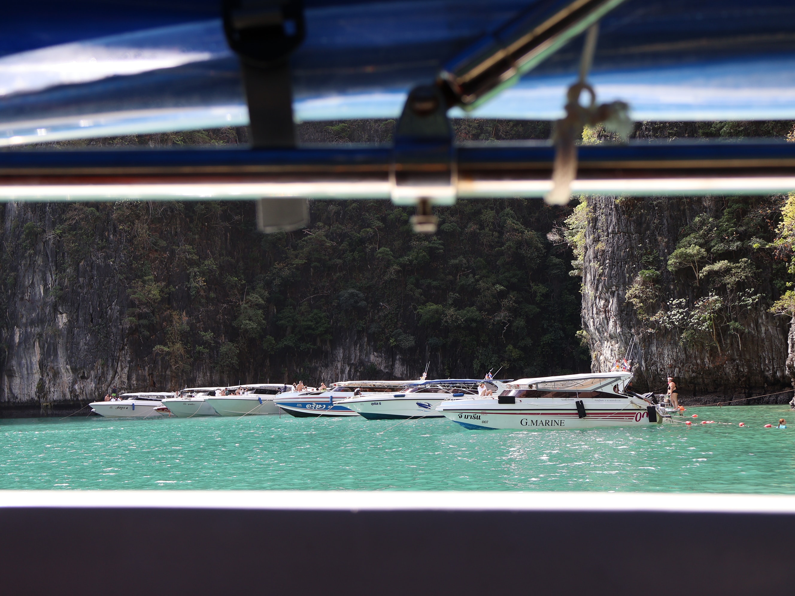 Longtail Boats Limestone Cliffs