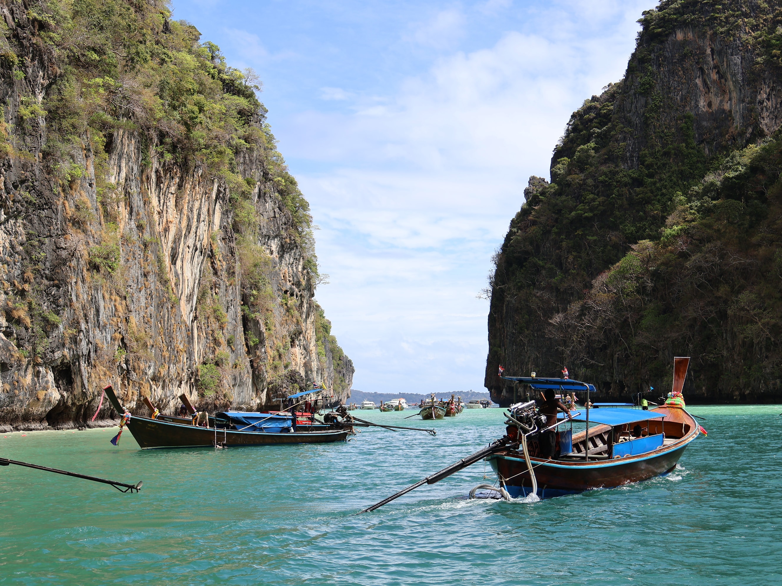 Longtail Boats Sea Cliffs